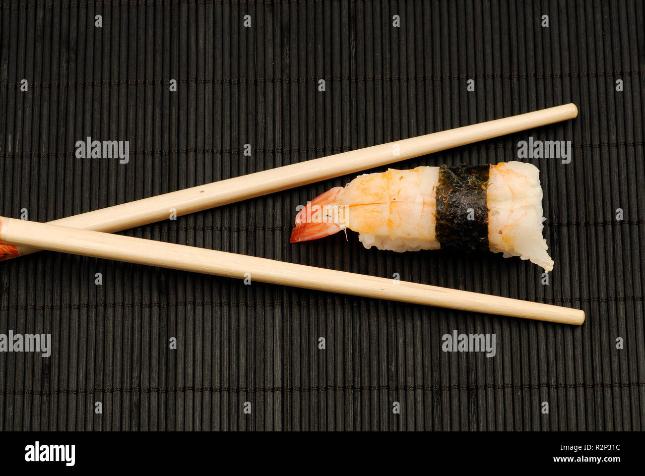 chopsticks and sushi nigiri Stock Photo