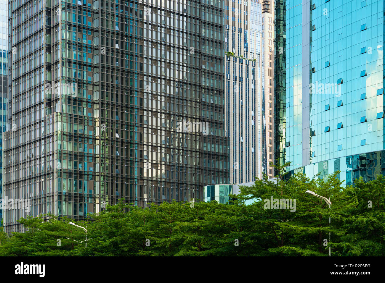 Shenzhen, China - financial district - Futian - some giant glass facade of several skyscrapers side by side Stock Photo