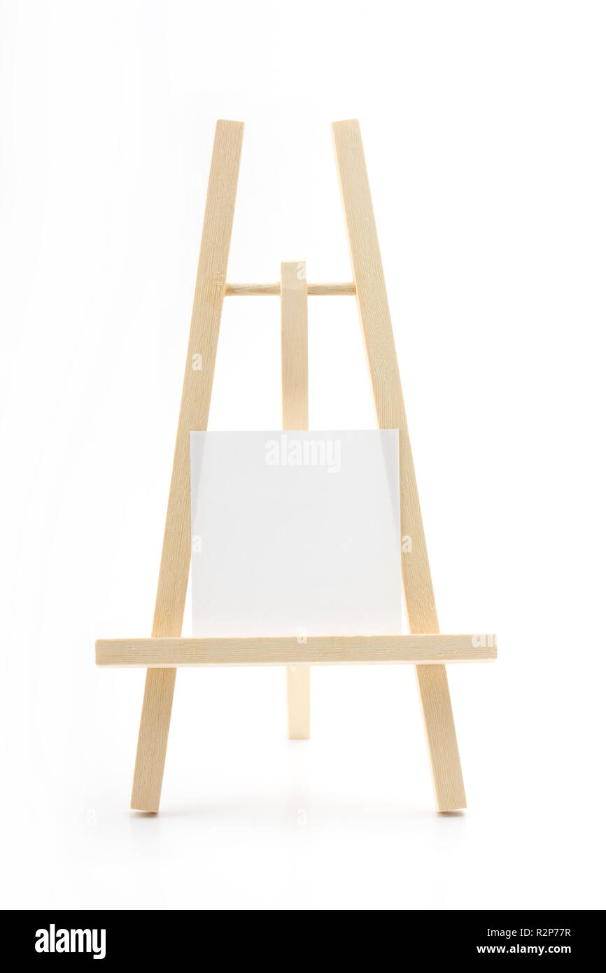 easel with blank notepad on white background Stock Photo Alamy