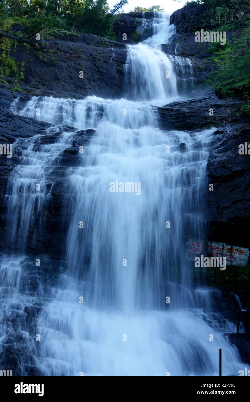 flowing waterfall from the mountains Stock Photo