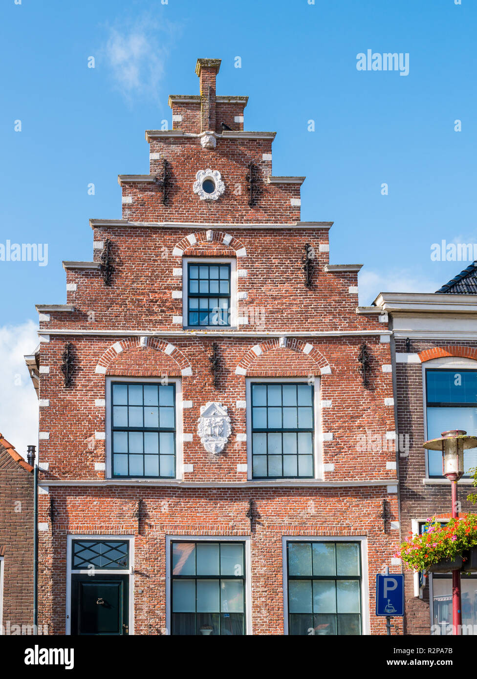 Stepped gable of historic house in old town of Workum, Friesland, Netherlands Stock Photo