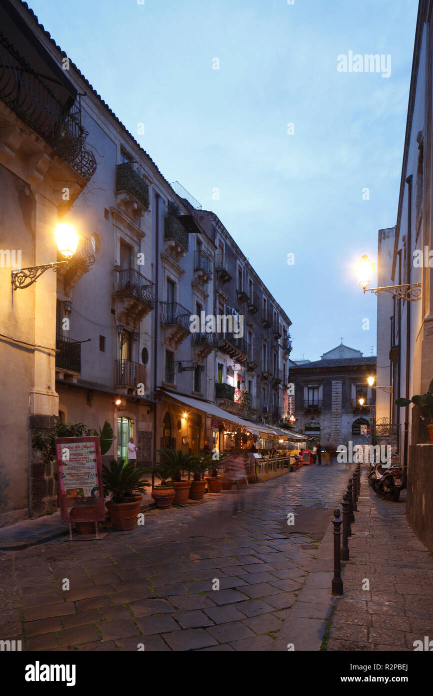 Old town lane with old house facades at dusk hires stock photography