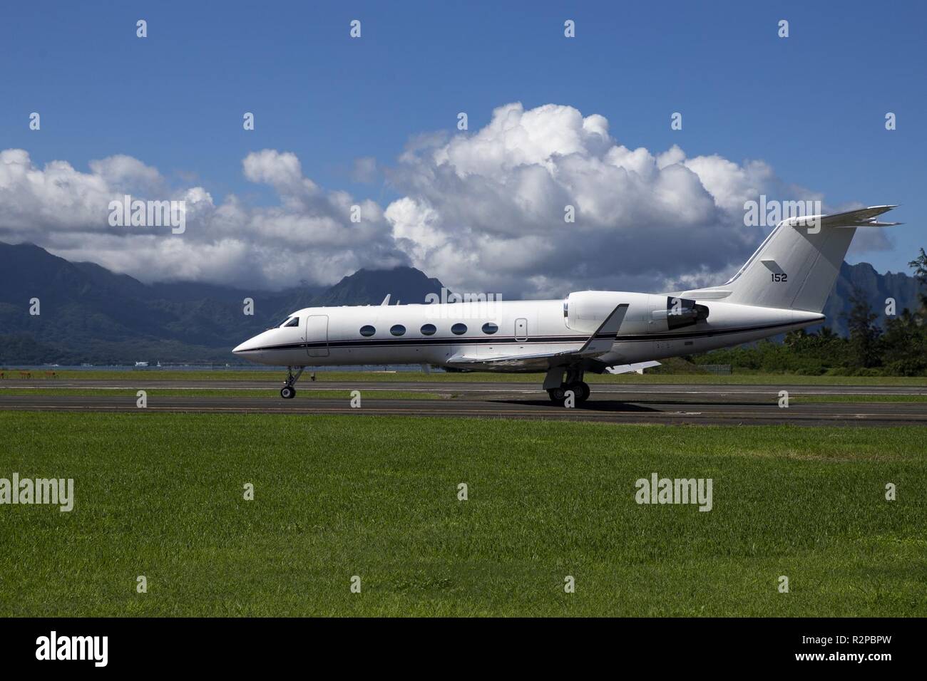A C-20G Gulfstream aircraft arrives aboard Marine Corps Air Station Kaneohe Bay after being transferred to United States Marine Corps control from the United States Navy, Marine Corps Base Hawaii, Oct. 31, 2018. The new C-20G aircraft was obtained to replace the only other C-20G Gulfstream in the Marine Corps, the iconic 'Grey Ghost' while it undergoes heavy maintenance. Stock Photo