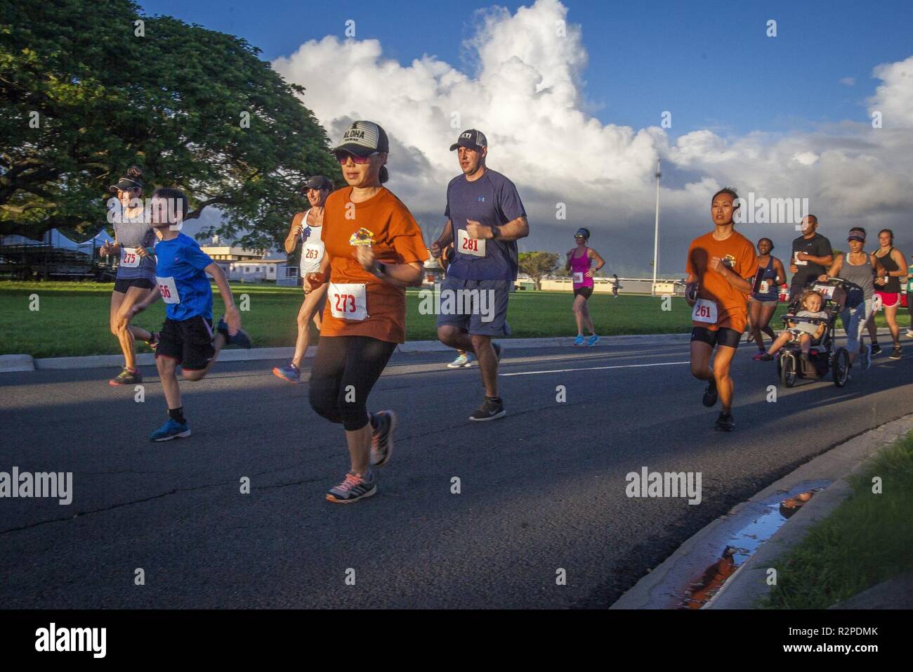 Contestants participate in the Turkey Trot 5k and 10k run, Marine Corps Base Hawaii, Nov. 3, 2018. The event, hosted by 3rd Radio Battalion and Marine Corps Community Services Hawaii, is an annual Thanksgiving-themed event that is open to U.S. Service members, their families, and civilian participants. The event promotes readiness and resiliency across the installation and local community by encouraging healthy, family-oriented activity. Stock Photo