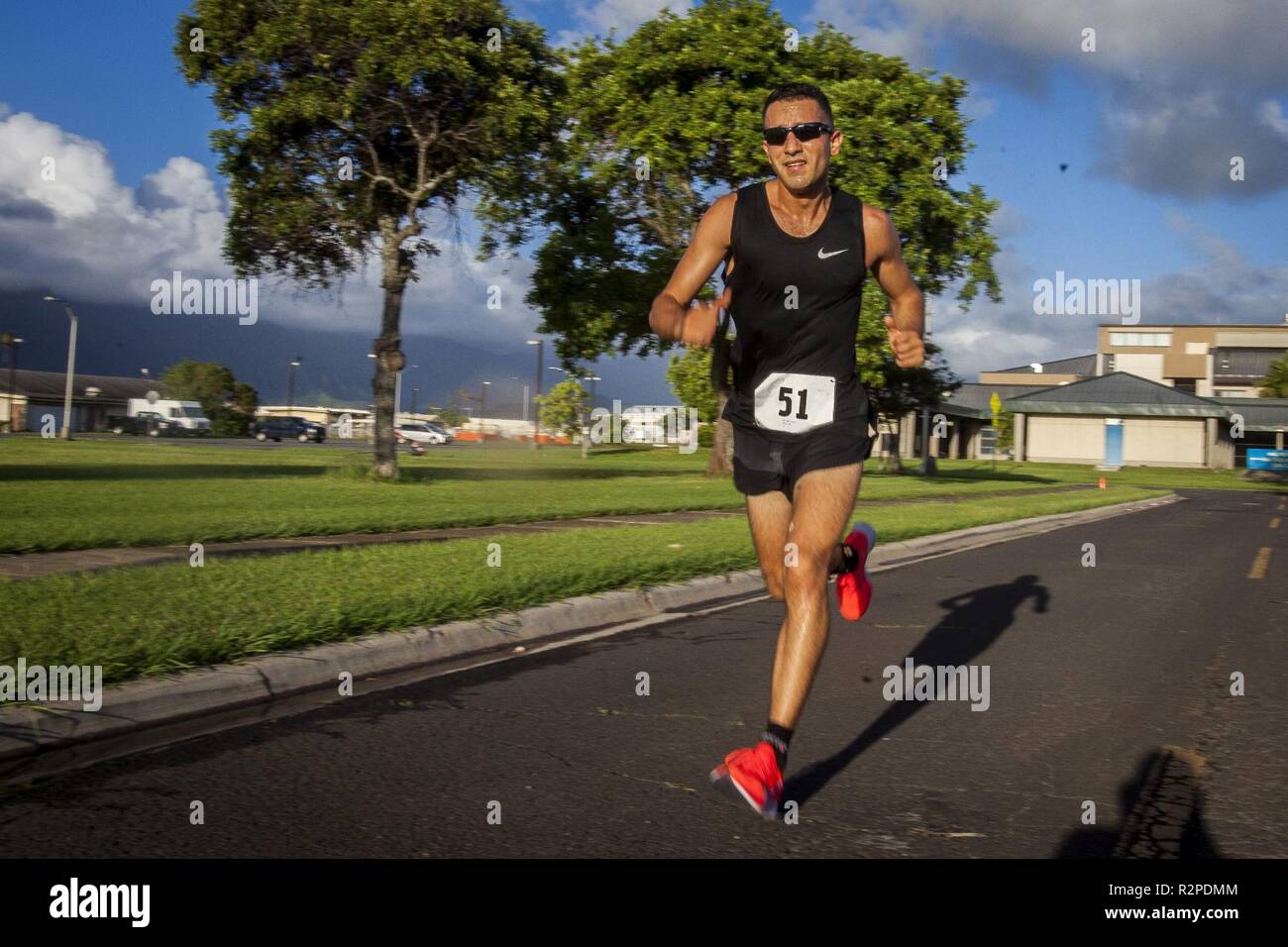 A contestant runs during the Turkey Trot 5k and 10k run, Marine Corps Base Hawaii, Nov. 3, 2018. The event, hosted by 3rd Radio Battalion and Marine Corps Community Services Hawaii, is an annual Thanksgiving-themed event that is open to U.S. Service members, their families, and civilian participants. The event promotes readiness and resiliency across the installation and local community by encouraging healthy, family-oriented activity. Stock Photo