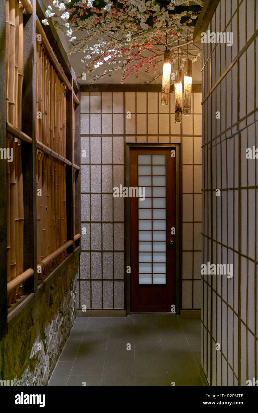 Japanese public toilet entrance foyer built in the ancient traditional style including fusuma sliding doors with shouji paper-covered sliding screens Stock Photo