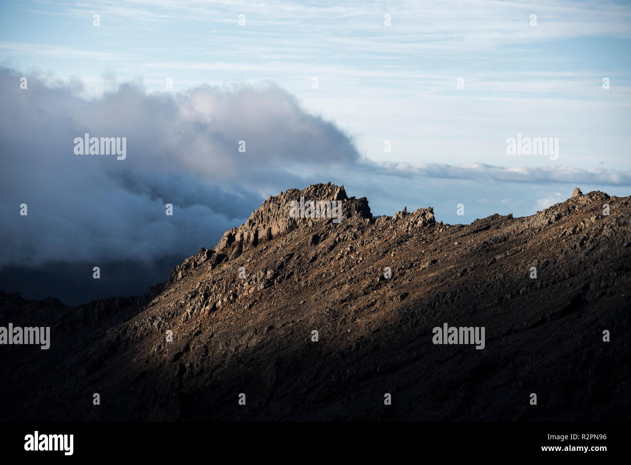 Mount Ruapehu, New Zealand. Last light falls on rocky ridge Stock Photo