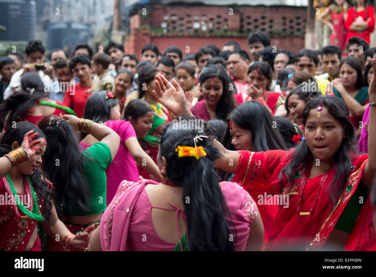 Kathmandu, Nepal. Young ladies dance during Teej festival Stock Photo