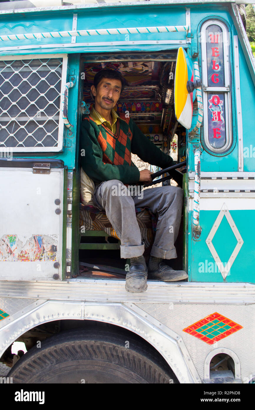 Kashmir, India. Truck driver on his way to Kargil Stock Photo