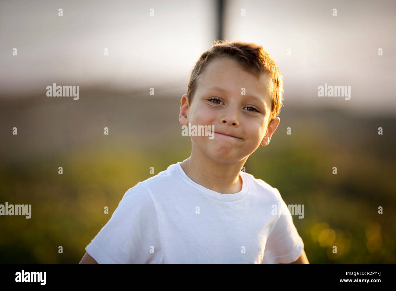 Portrait of a smiling young boy Stock Photo - Alamy