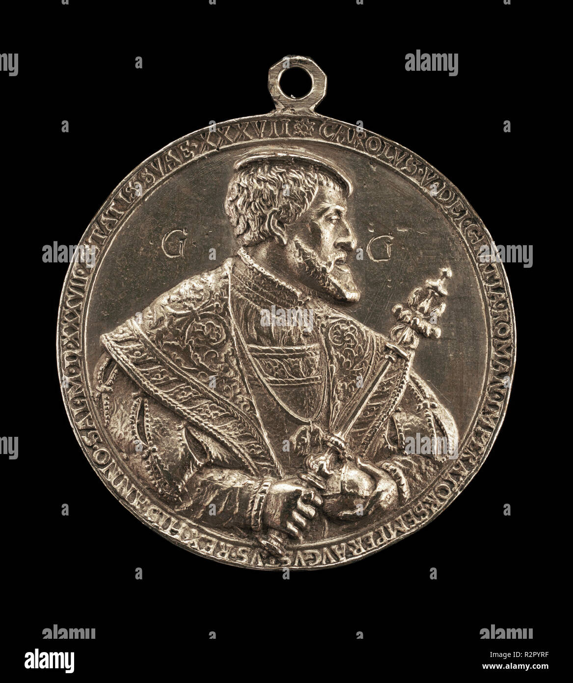 Charles V, 1500-1558, King of Spain 1516-1556, Holy Roman Emperor 1519 [obverse]. Dated: 1537. Dimensions: overall (height with suspension loop): 7.16 cm (2 13/16 in.)  overall (diameter without loop): 6.38 cm (2 1/2 in.)  gross weight: 58.31 gr (0.129 lb.)  axis: 12:00. Medium: silver//With loop. Museum: National Gallery of Art, Washington DC. Author: Hans Reinhart the Elder. Stock Photo