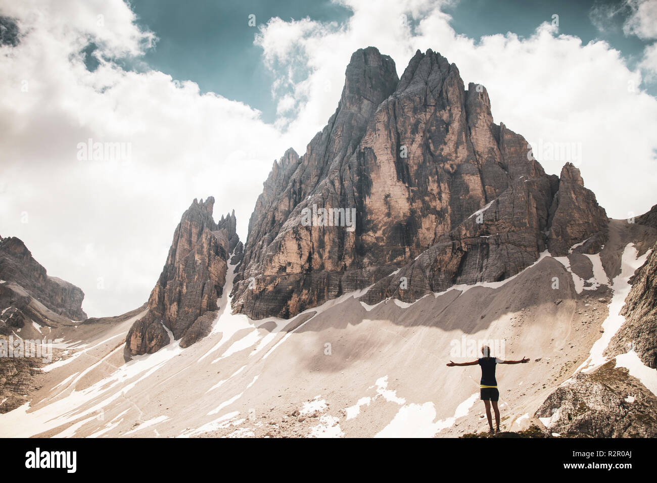 Italy, Dolomites, Alta Pusteria, woman in Naturpark Drei Zinnen (Three Peaks of Lavaredo Nature Park) Stock Photo