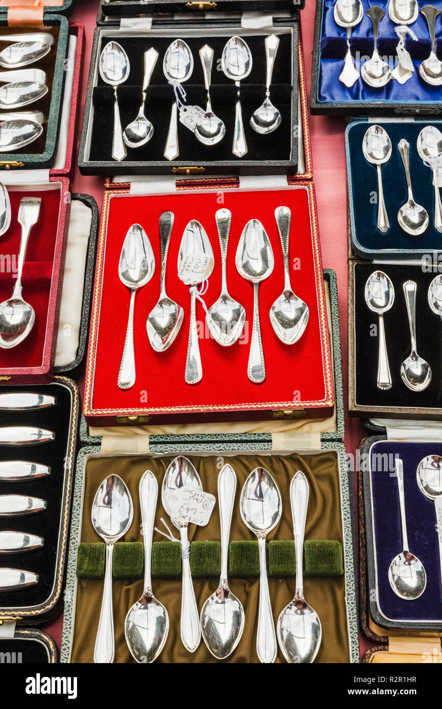 England, London, Bermondsey, Bermondsey Square, Bermondsey Antiques Market, Antiques Stall Display of Silver Tableware Stock Photo