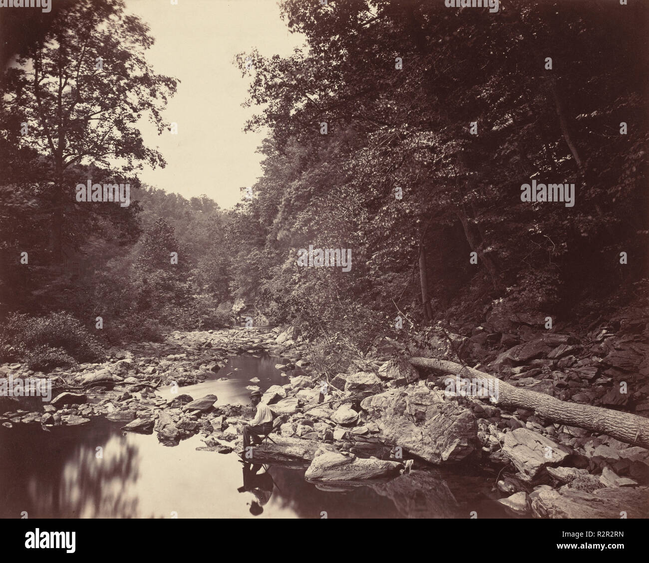 The Wissahickon Creek near Philadelphia. Dated: c. 1863. Dimensions: image: 26.3 × 33 cm (10 3/8 × 13 in.). Medium: albumen print. Museum: National Gallery of Art, Washington DC. Author: John Moran. Stock Photo