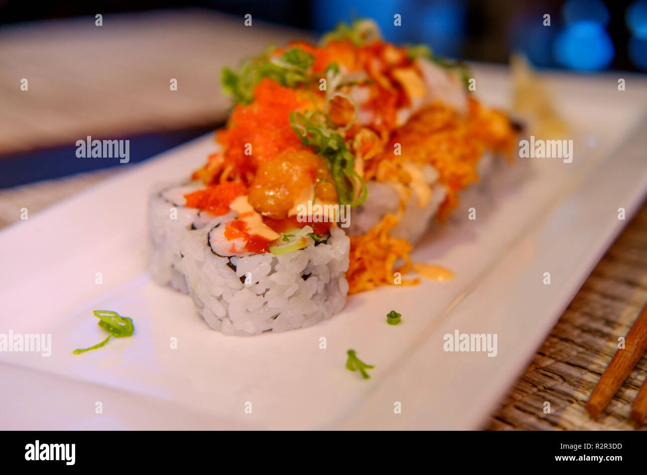 Beautiful spicy special Volcano sushi roll with crab meat and spicy