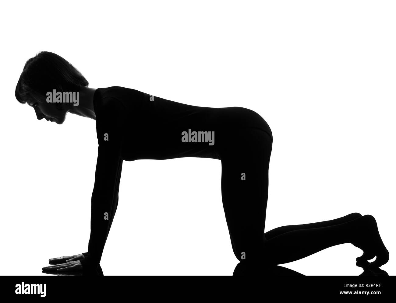 Girl kneeling silhouette hi-res stock photography and images - Alamy