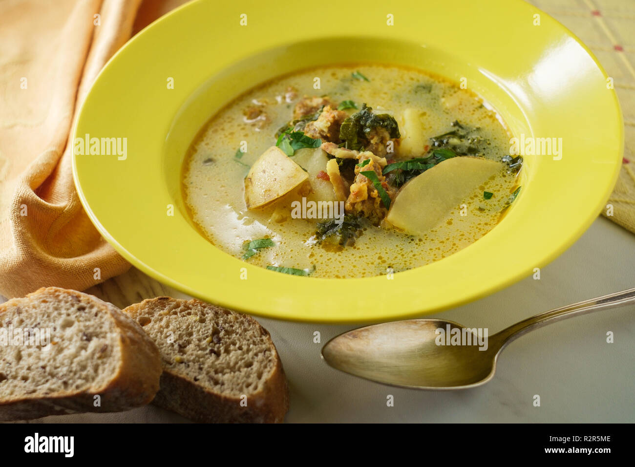 Sausage and kale zuppa toscana italian creamy soup Stock Photo Alamy
