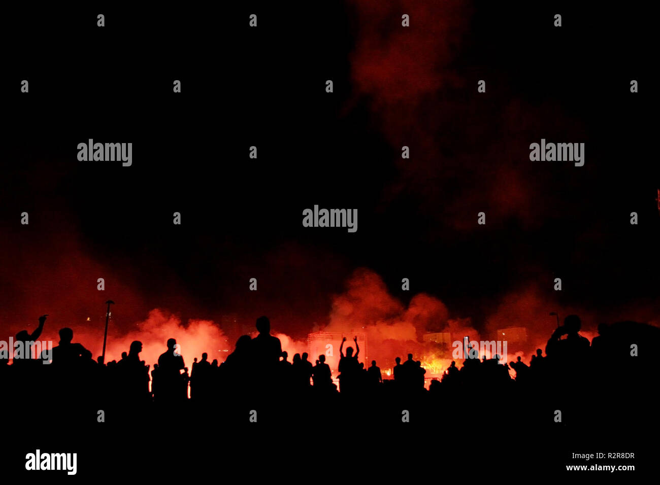 people watching explosions Stock Photo