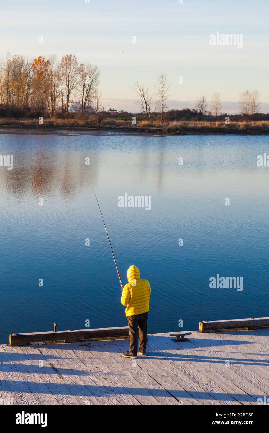 Fisherman yellow jacket hi-res stock photography and images - Alamy
