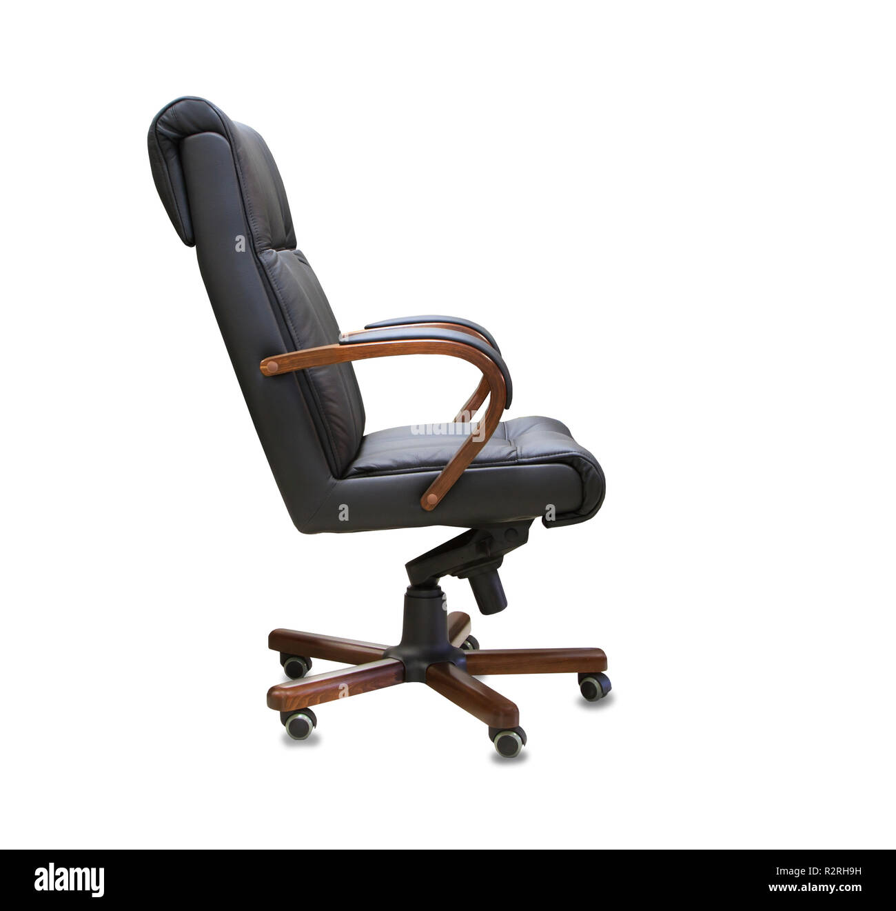 The office chair from black leather. Isolated Stock Photo