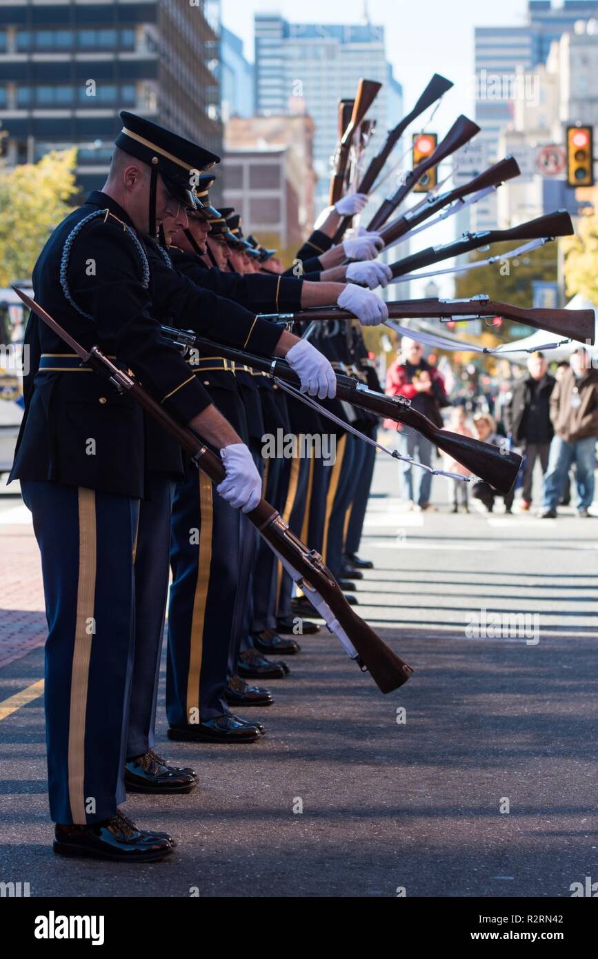Soldiers assigned to the U.S. Army Drill Team, 4th Battalion, 3d U.S. Infantry Regiment (The Old Guard) perform after the conclusion of the 4th Annual Philadelphia Veterans Day Parade in Philadelphia, Pennsylvania, November 4, 2018. Stock Photo