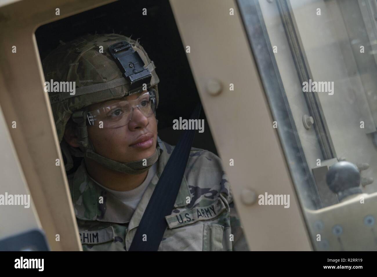 Pvt. Jocalyn Yochim, a Bel Air, Maryland native, and horizontal construction engineer with the 887th Engineer Support Company, prepares to drive M1151 HMMWV to a staging area, Nov. 5 at Donna, Texas. U.S. Northern Command is providing military support to the Department of Homeland Security and U.S. Customs and Border Protection to secure the southern border of the United States. Stock Photo