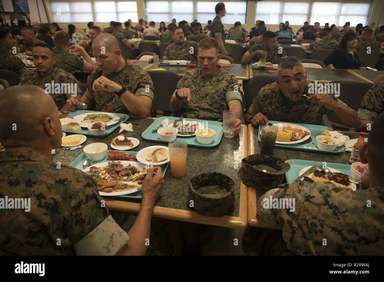U.S. Marines eat their meals during a birthday lunch at the Anderson