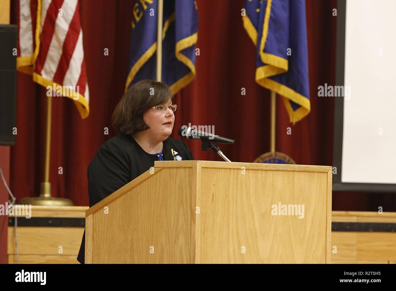 Molly Reilly, mayor of Sackets Harbor, New York, speaks during the Sackets Harbor Central School
