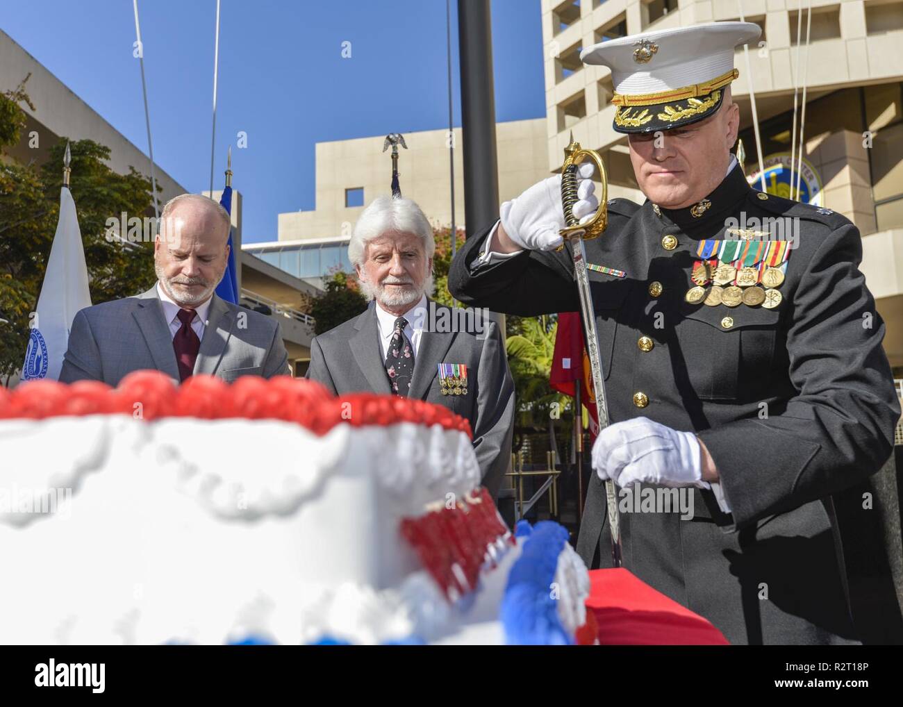 SAN DIEIGO (Nov. 09,2018) — Lieutenant Colonel James Hoffmann, commanding officer of the Wounded Warrior Battalion at Naval Medical Center San Diego (NMCSD) cleans the sword after cutting the first piece of cake at a celebration of the 243rd Marine Corps Birthday.  NMCSD is the largest naval hospital on the west coast, employing more than 6,000 Sailors, Marines, civilians and contractors. Stock Photo
