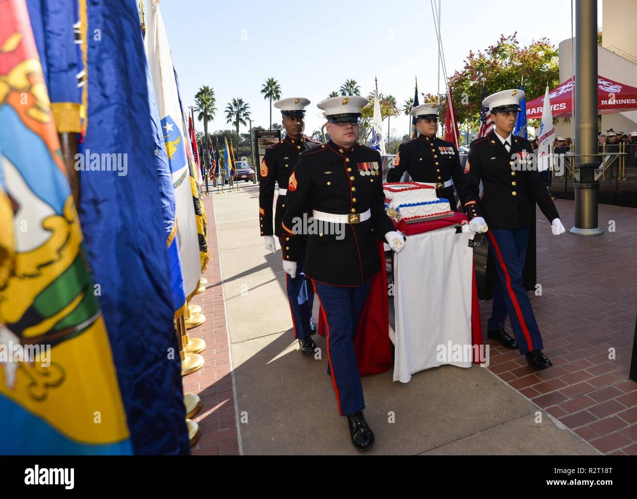 SAN DIEIGO (Nov. 09,2018) — Marines from the Wounded Warrior Battalion at Naval Medical Center San Diego (NMCSD) march the cake out of the courtyard  at the celebration of the 243rd Marine Corps Birthday.  NMCSD is the largest naval hospital on the west coast, employing more than 6,000 Sailors, Marines, civilians and contractors. Stock Photo