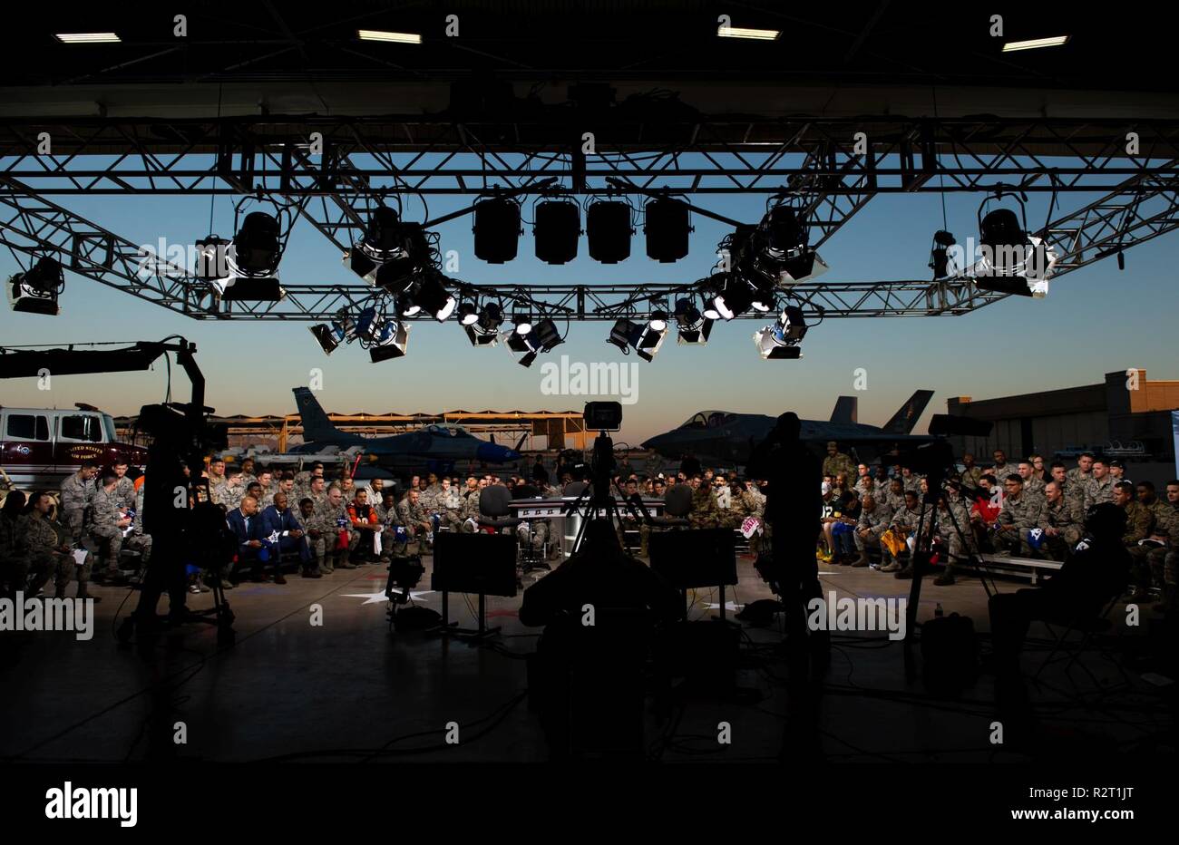 Thunderbolts gather for an ESPN First Take live show at Luke Air Force Base, Ariz., Nov. 9, 2018. Every year, the live two-hour show honors service members near Veterans Day by telecasting their show on military installations. Stock Photo