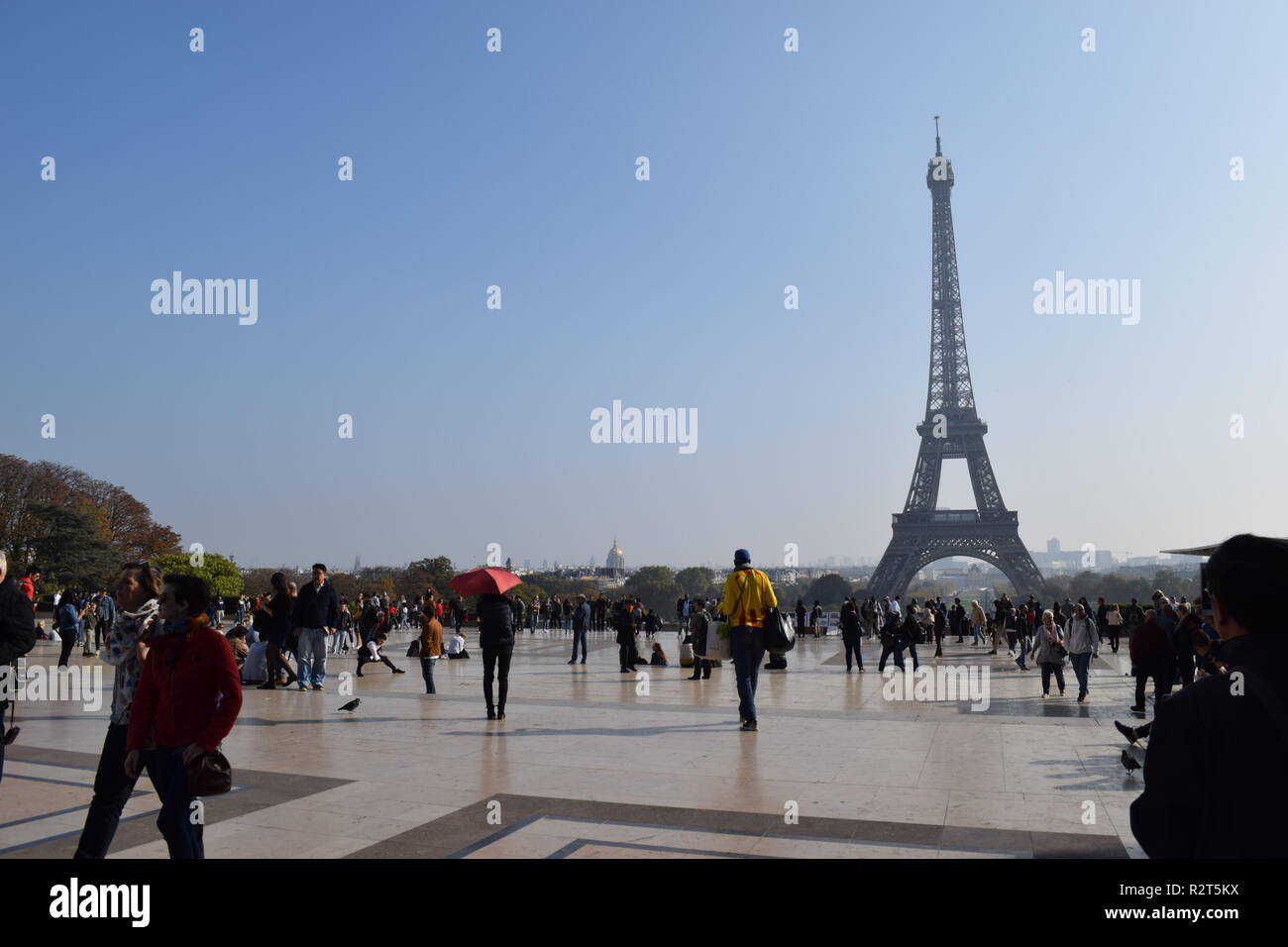 Tourists take in the iconic view of the Eiffel Tower from the terrace at Trocadero Paris, France Stock Photo