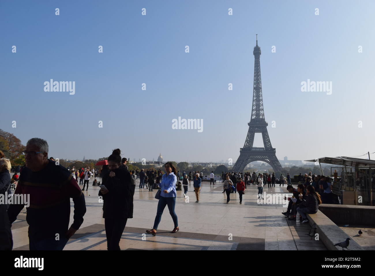 Tourists take in the iconic view of the Eiffel Tower from the terrace at Trocadero Paris, France Stock Photo