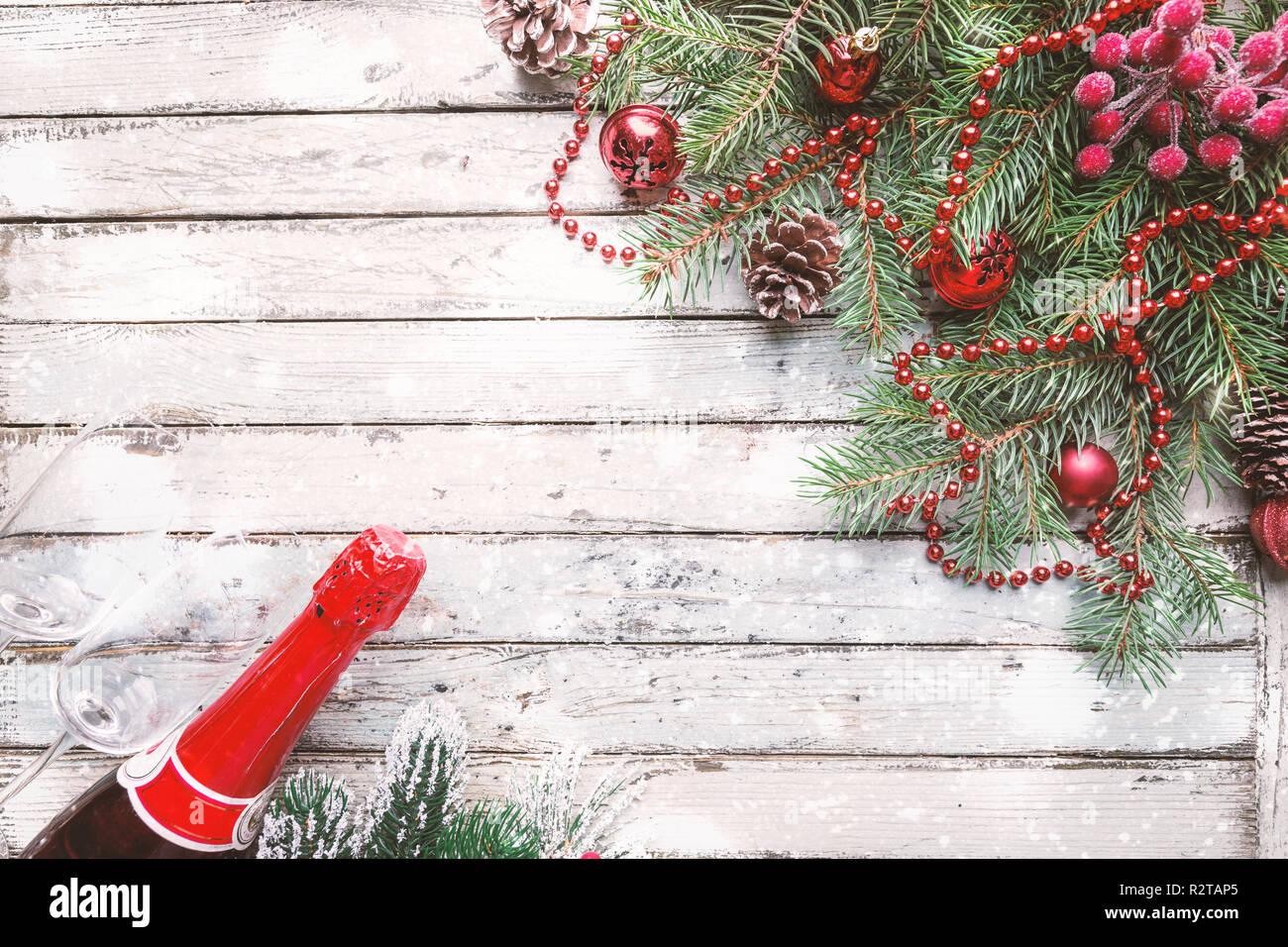 Christmas wooden background with fir tree and decorations. Top view ...