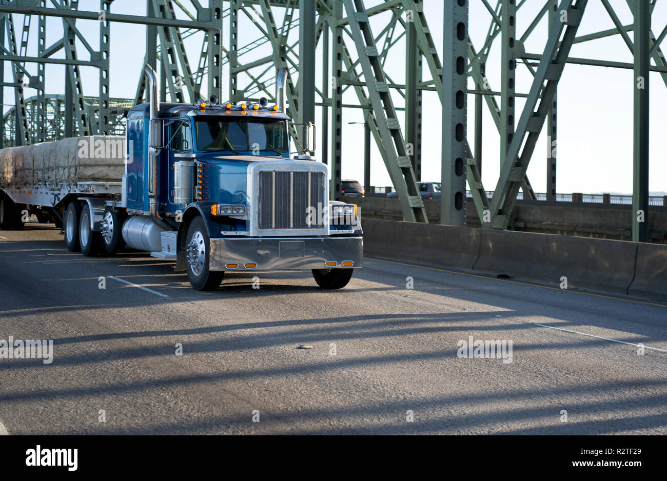 Blue Big Rig Classic American Bonnet Semi Truck With Low Cabin And