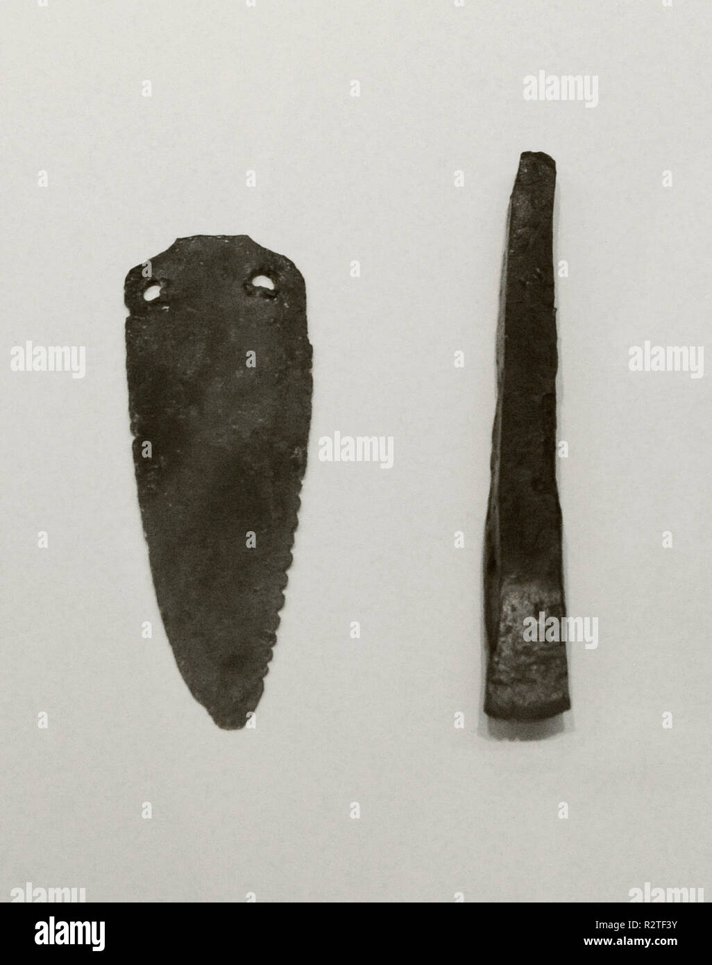 Saw and chisel. Chalcolithic. Copper. Unknown origin. National Archaeological Museum. Madrid. Spain. Stock Photo