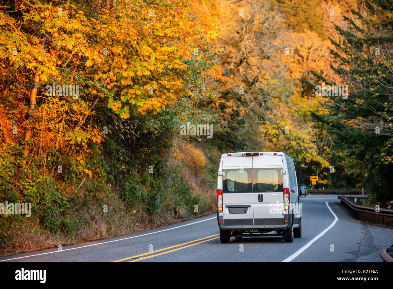 Compact white economical mini van for commercial delivery and business