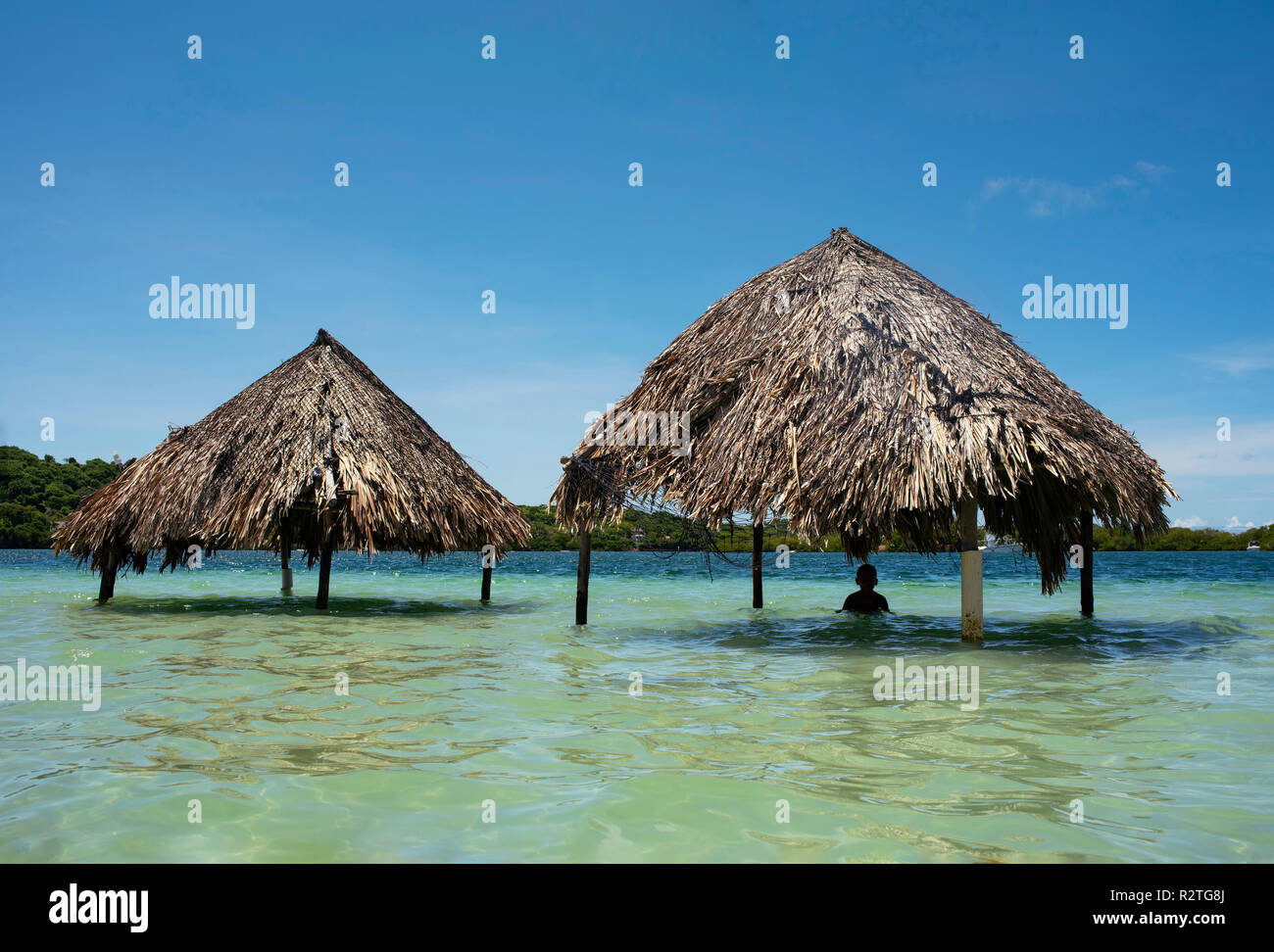 Mangrove beach pavilions (cabanas) on Playa Cholón, Rosario Islands, Colombia. Oct 2018 Stock Photo
