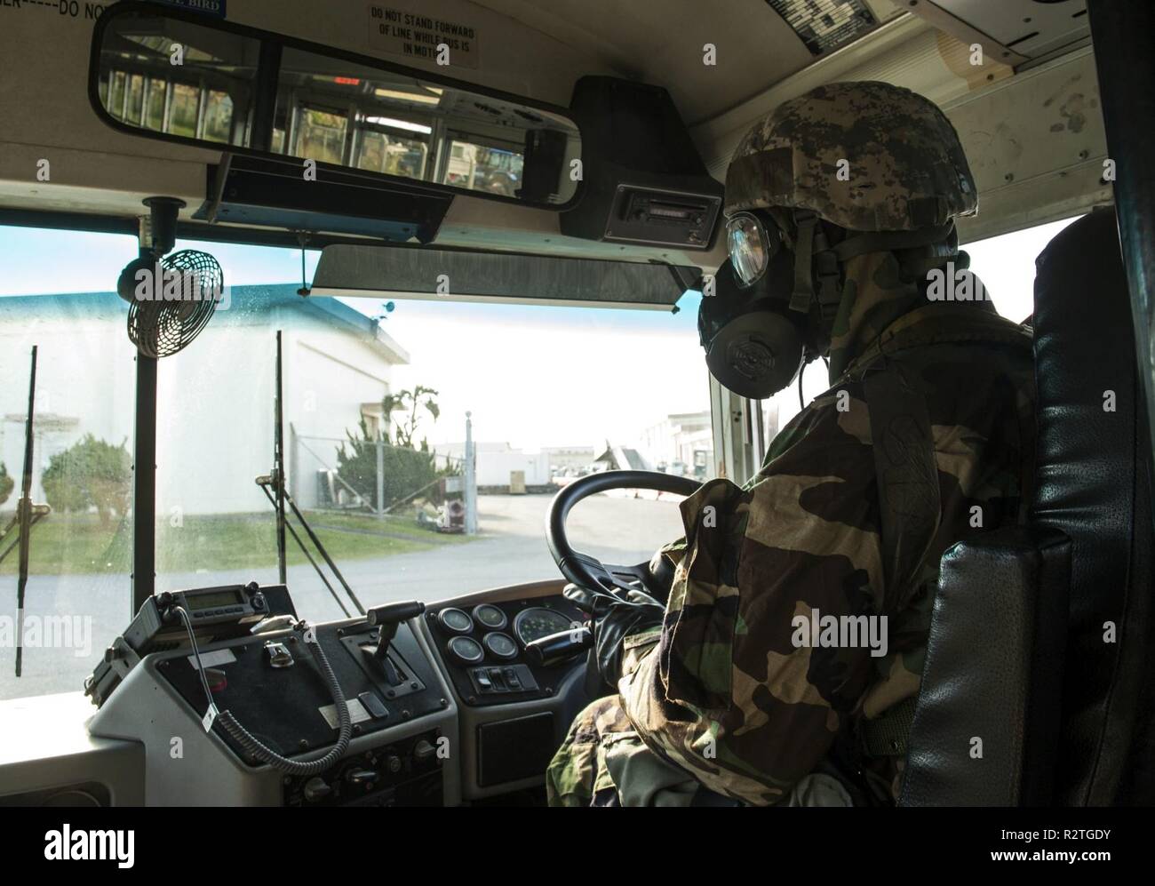 U.S. Air Force Airman 1st Class Robert Mears, 18th Logistics Readiness  Squadron vehicle operator, drives a vehicle during the mission oriented  protective posture level 4 ground transportation training course at Kadena  Air