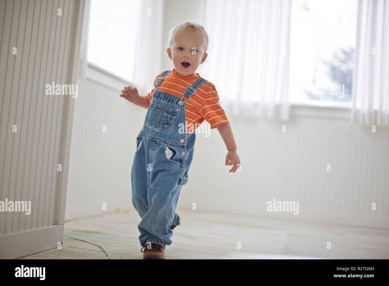 baby wearing dungarees