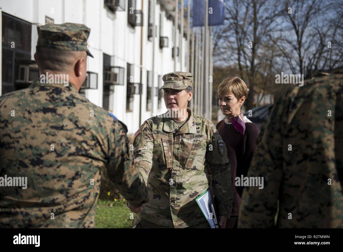 U.S. Army Brig. Gen. Marti Bissell, NATO Headquarters Sarajevo commander, greets Armed Forces of Bosnia and Herzegovina soldiers while visiting 5th Infantry Brigade in Tuzla, BiH Oct. 30, 2018. NHQSa staff visited the brigade to meet the soldiers and their leadership, and to familiarize themselves with 5th Infantry Brigade's mission and capabilities. Stock Photo