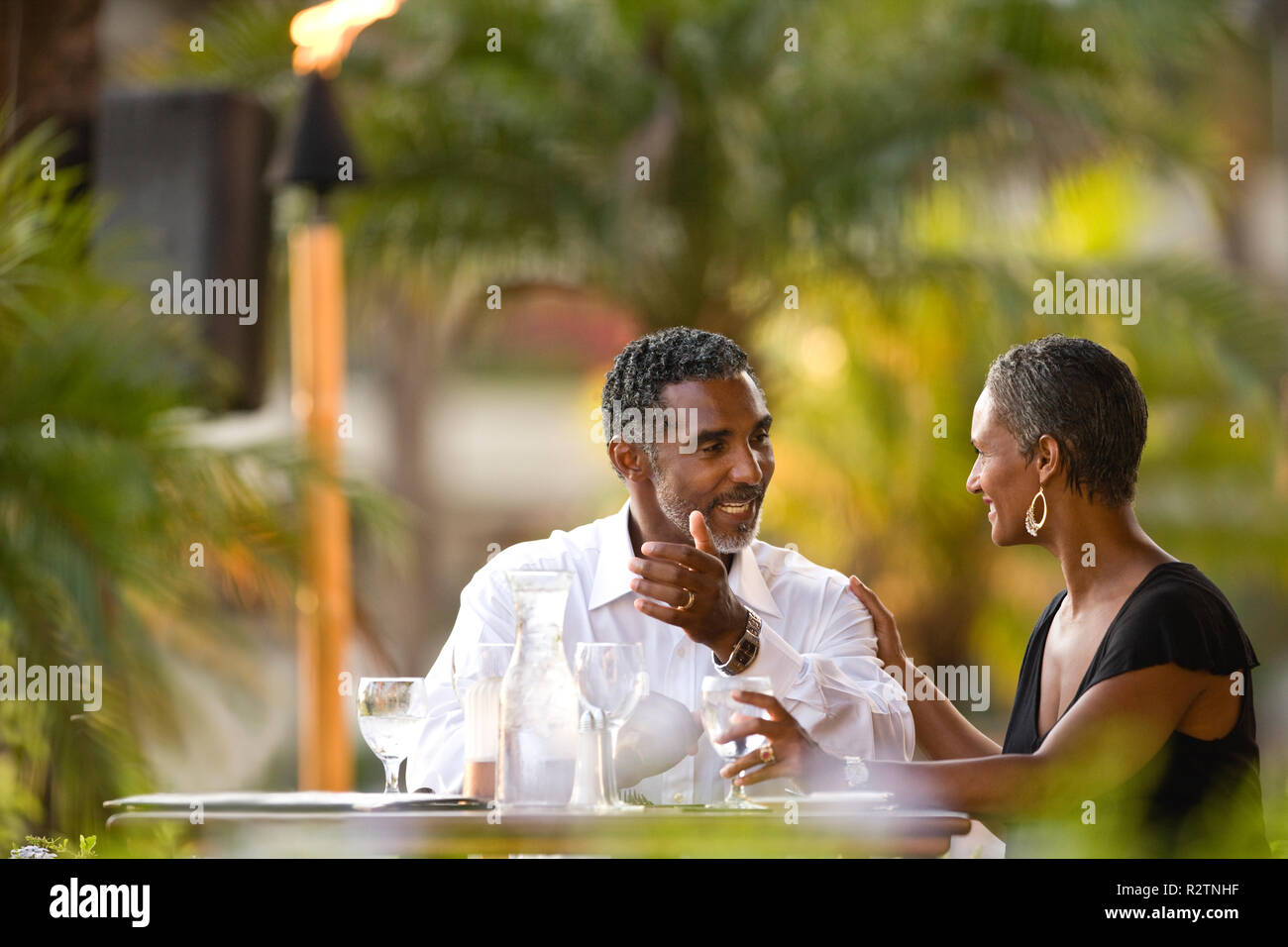 Couple having a romantic dinner. Stock Photo
