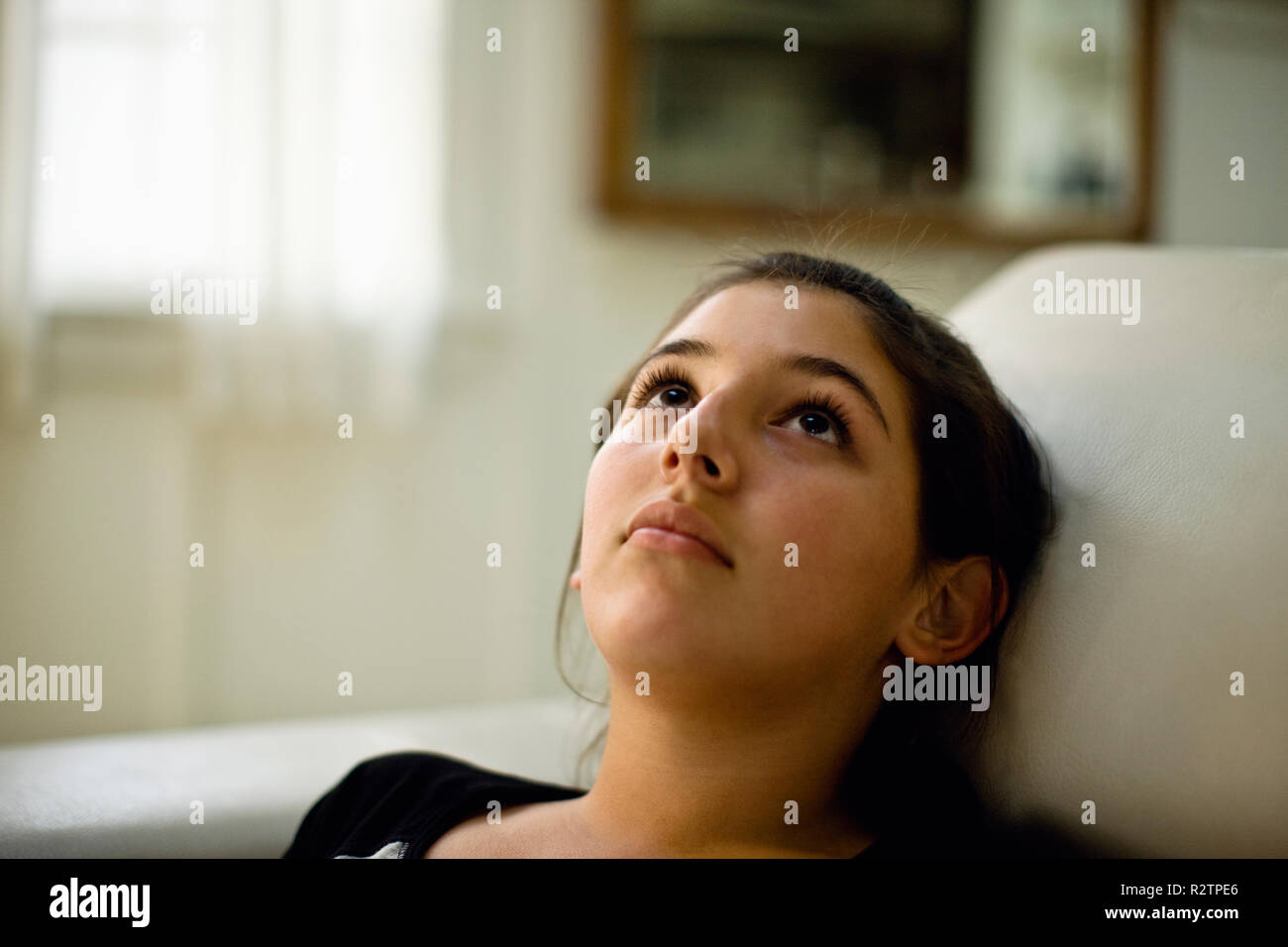 Preteen girl lying on back hi-res stock photography and images - Alamy
