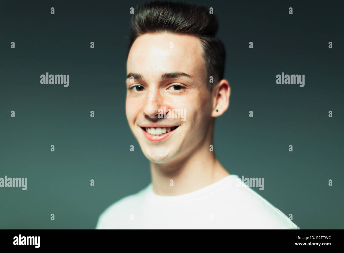 Portrait smiling, confident teenage boy Stock Photo