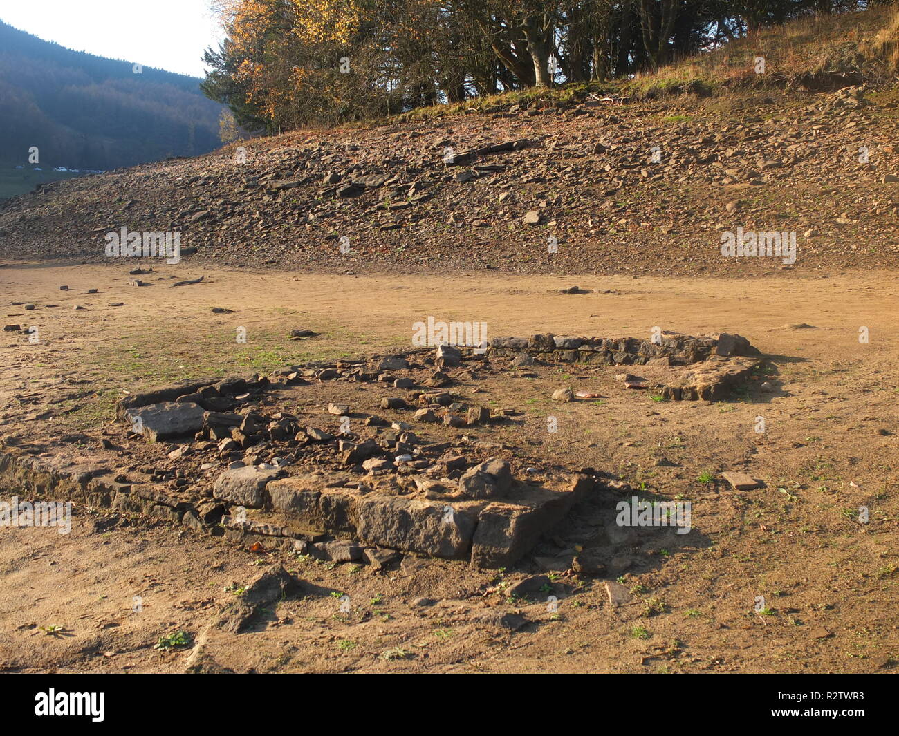 Exposed ruins of  the remains of Derwent Village on what is normally the bed of Ladybower Reservoir, exposed following 2018 heatwave Stock Photo