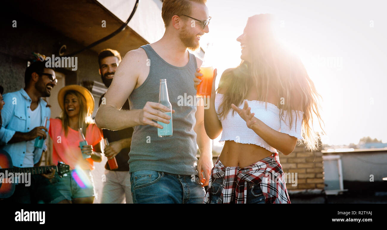 Friends having fun outdoors and are happy Stock Photo - Alamy