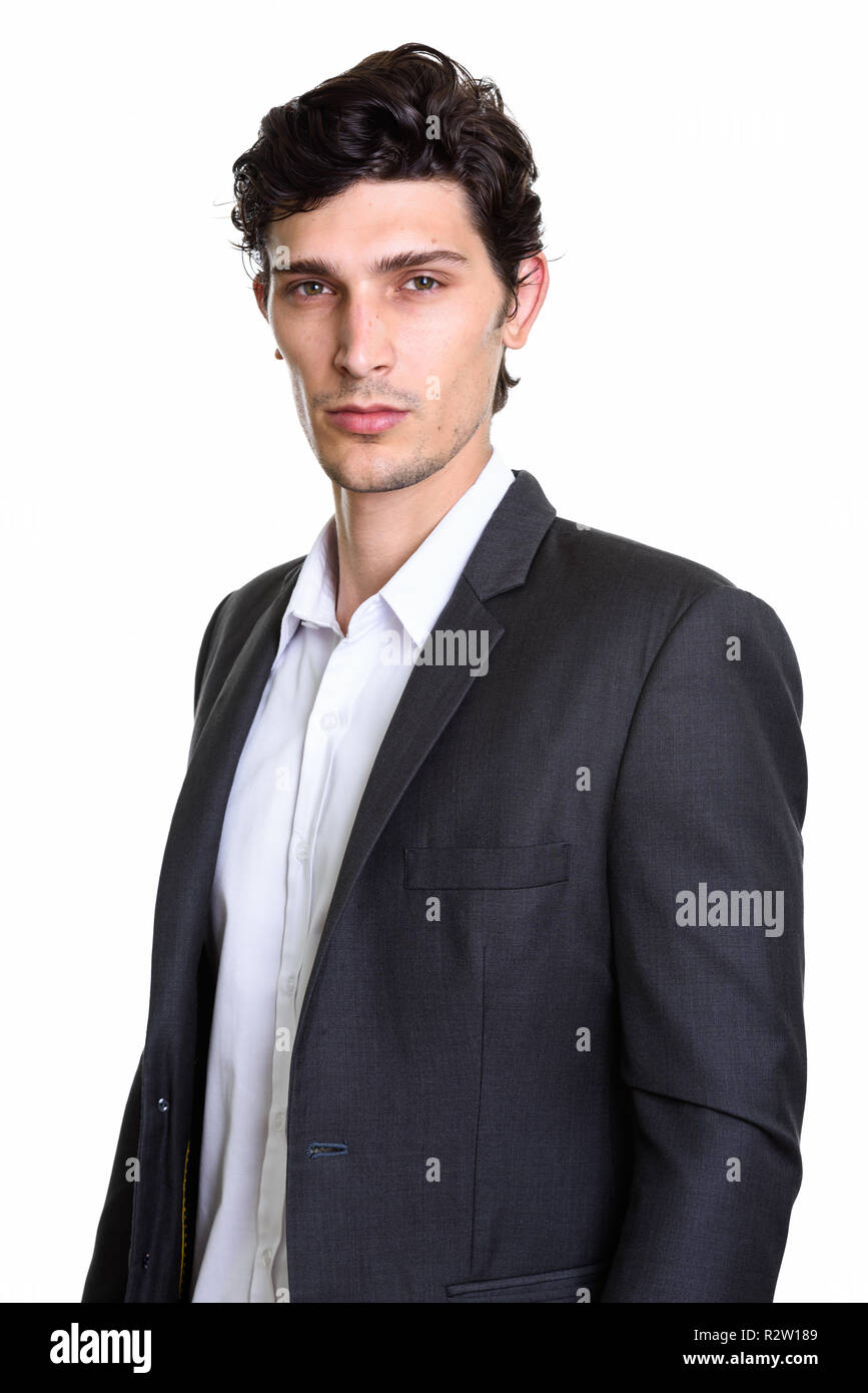 Studio shot of young handsome Brazilian businessman Stock Photo