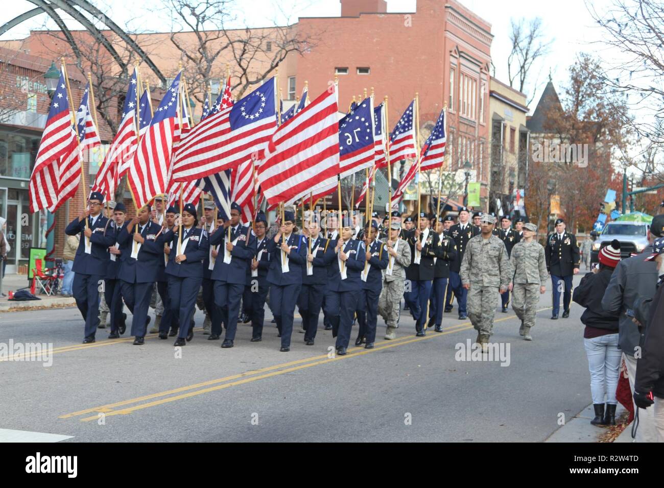 Nearly 40 service members from all five military branches proudly carry