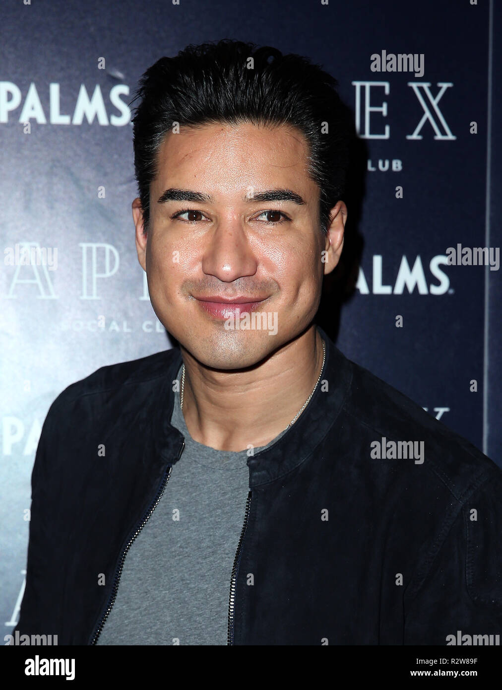 Celebrity television host Mario Lopez and wife Courtney Lopez celebrate