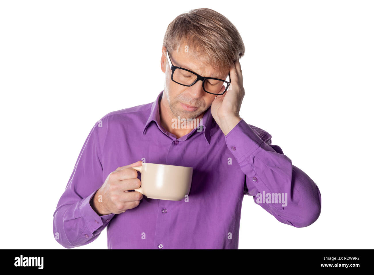 Handsome man with glasses over white background drinking a cup of